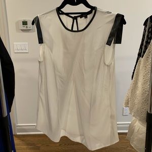 White leather capped sleeve blouse